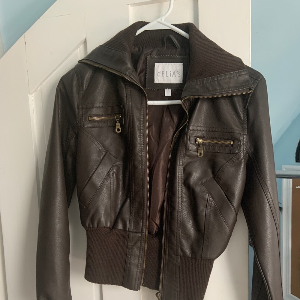 Delia’s brown leather jacket
